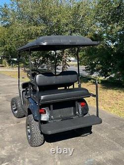 2017 Lifted 48V EZGO 4 Passenger Golf Cart with New Batteries, Paint, Lights, Seat
